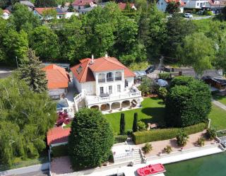 Einmalige Gelegenheit am Seeufer - außergewöhnliches Anwesen auf Pachtgrund zu verkaufen Bild